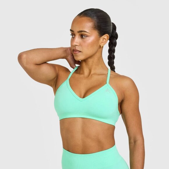 EnhanceLift™ Seamless Strappy Sports Bra with White Logo - Picture 4 of 4